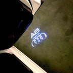 AUDI LOGO PROJECTOT LIGHTS Nr.46 (الكمية 1 = 2 Logo Films /2 أضواء الباب)
