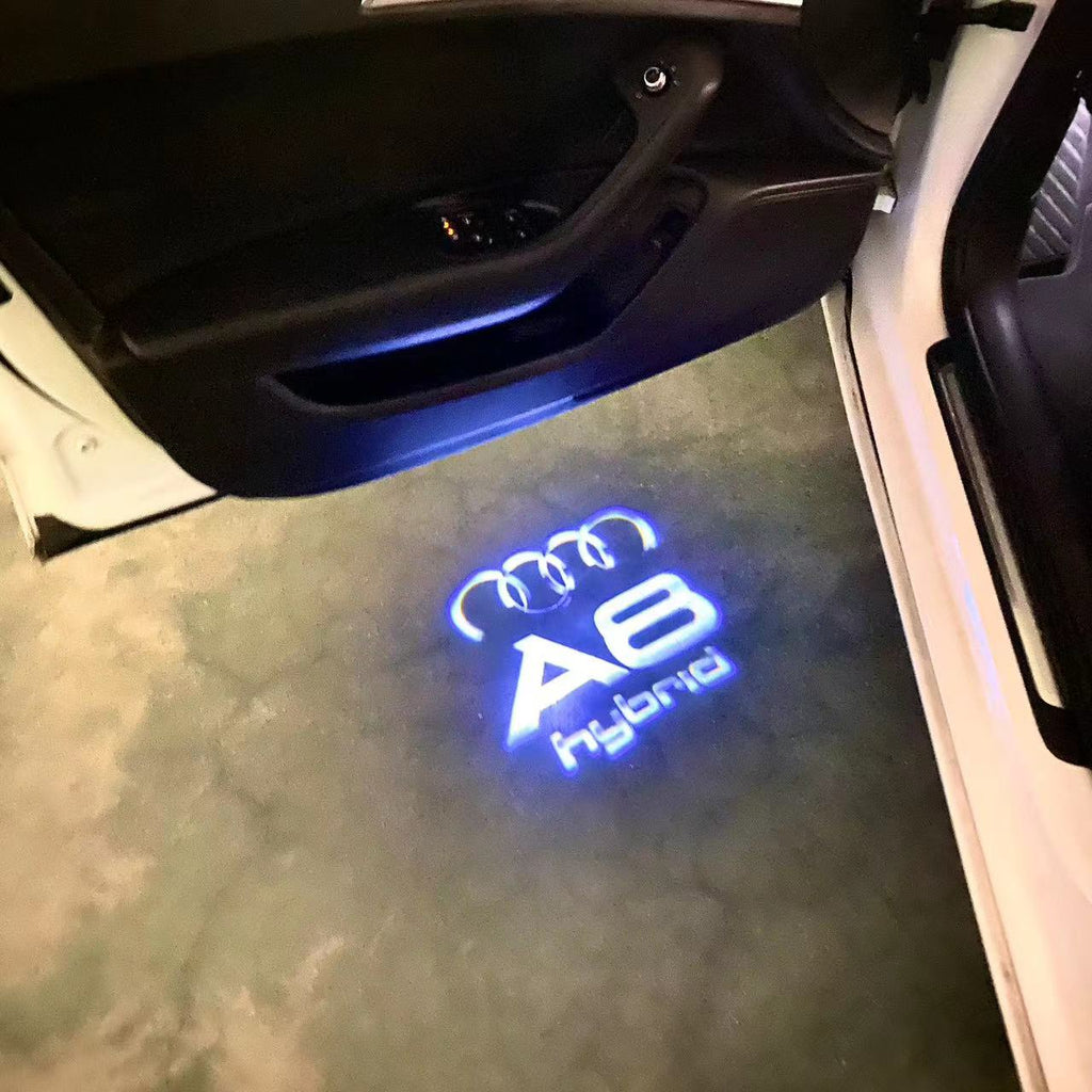 AUDI LOGO PROJECTOT LIGHTS Nr.46 (الكمية 1 = 2 Logo Films /2 أضواء الباب)