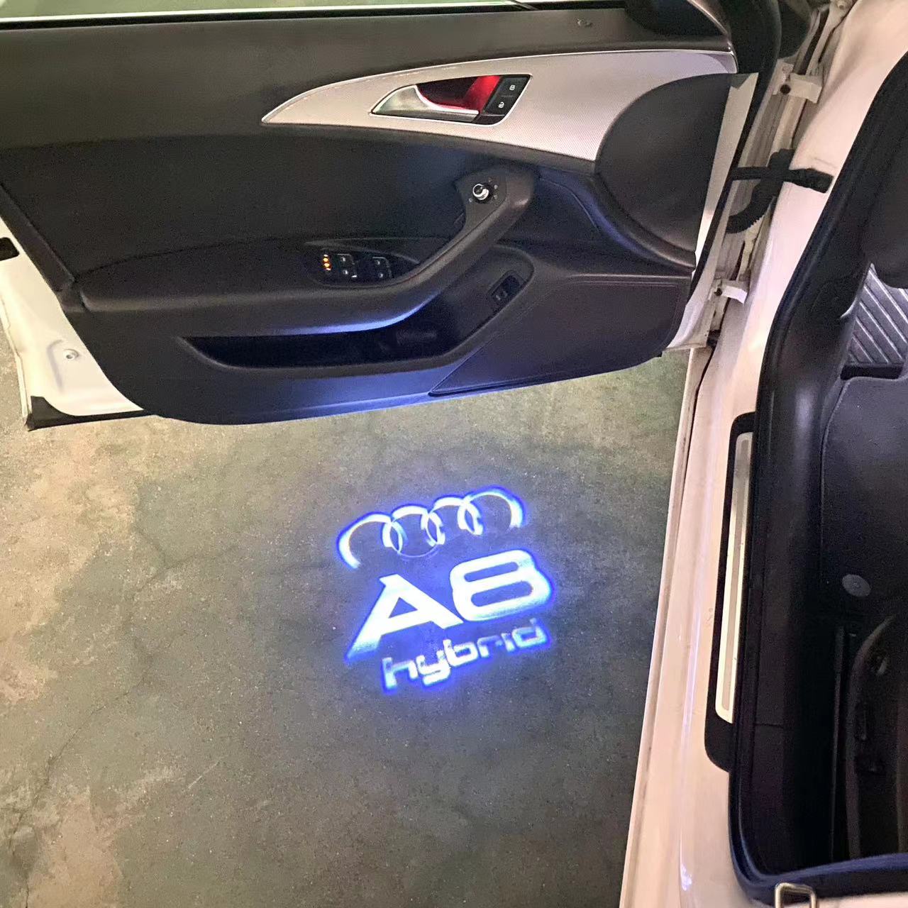 AUDI LOGO PROJECTOT LIGHTS Nr.46 (الكمية 1 = 2 Logo Films /2 أضواء الباب)