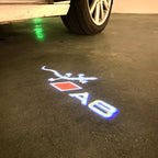 AUDI LOGO PROJECTOT LIGHTS Nr.46 (الكمية 1 = 2 Logo Films /2 أضواء الباب)