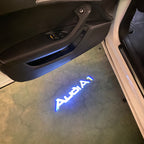 أضواء جهاز عرض شعار AUDI رقم 148 (الكمية 1 = 2 فيلم شعار / 2 مصباح باب)