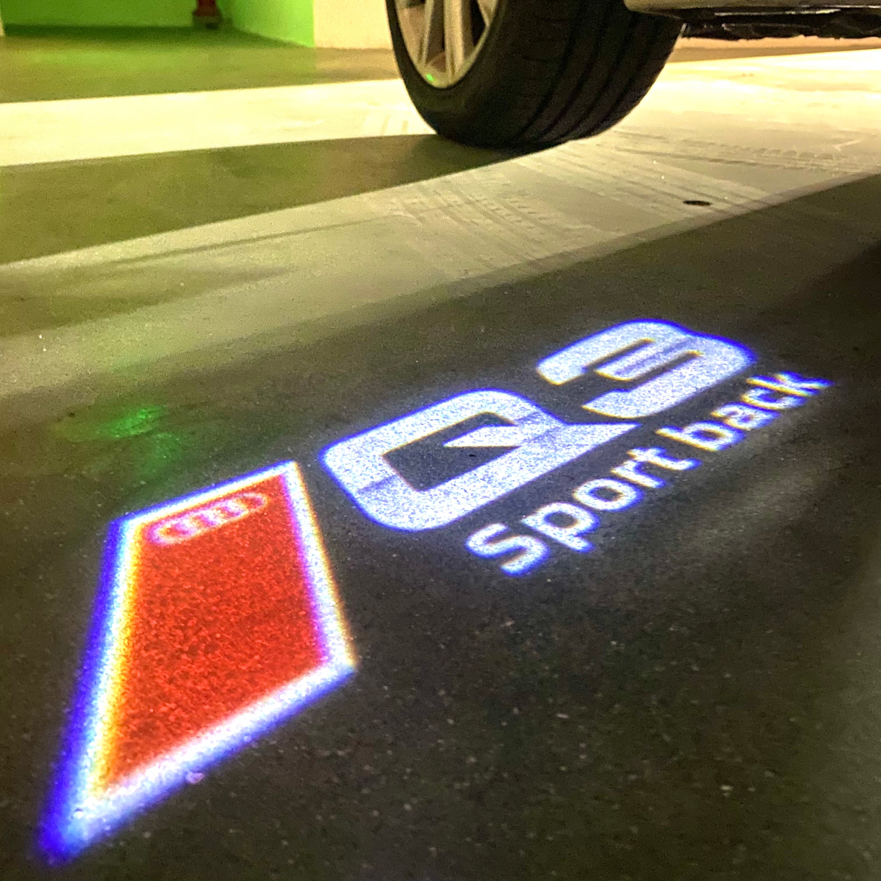 AUDI LOGO PROJECTOT LIGHTS Nr.120 (الكمية 1 = 2 Logo Films /2 أضواء الباب)
