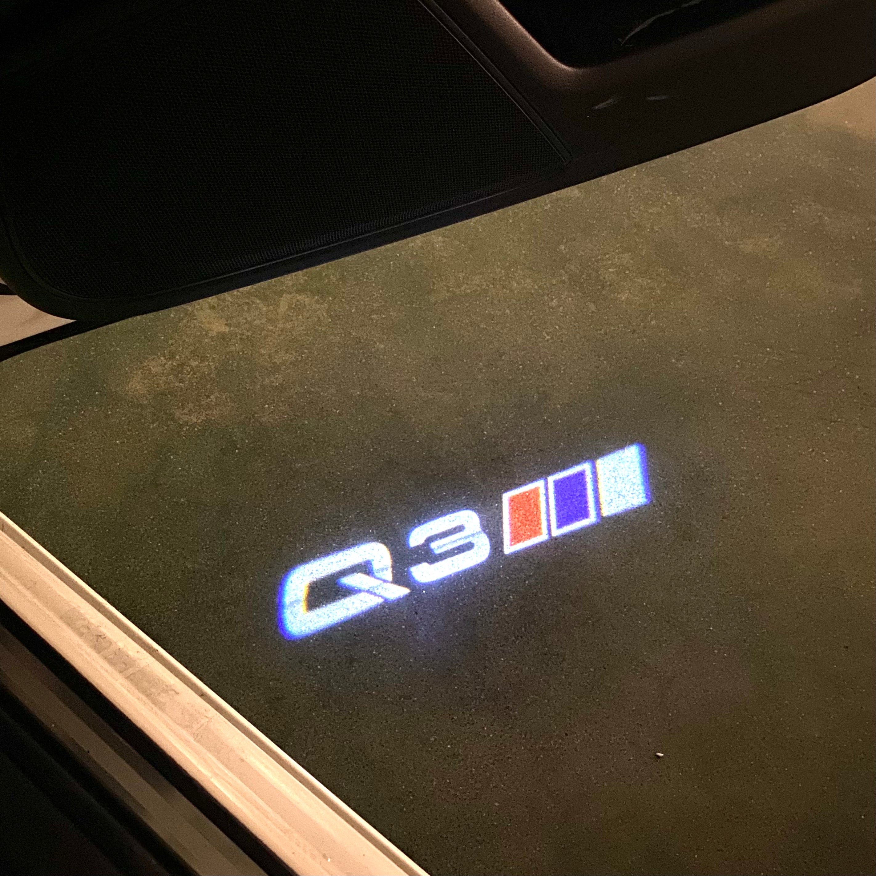 AUDI LOGO PROJECTOT LIGHTS Nr.120 (الكمية 1 = 2 Logo Films /2 أضواء الباب)