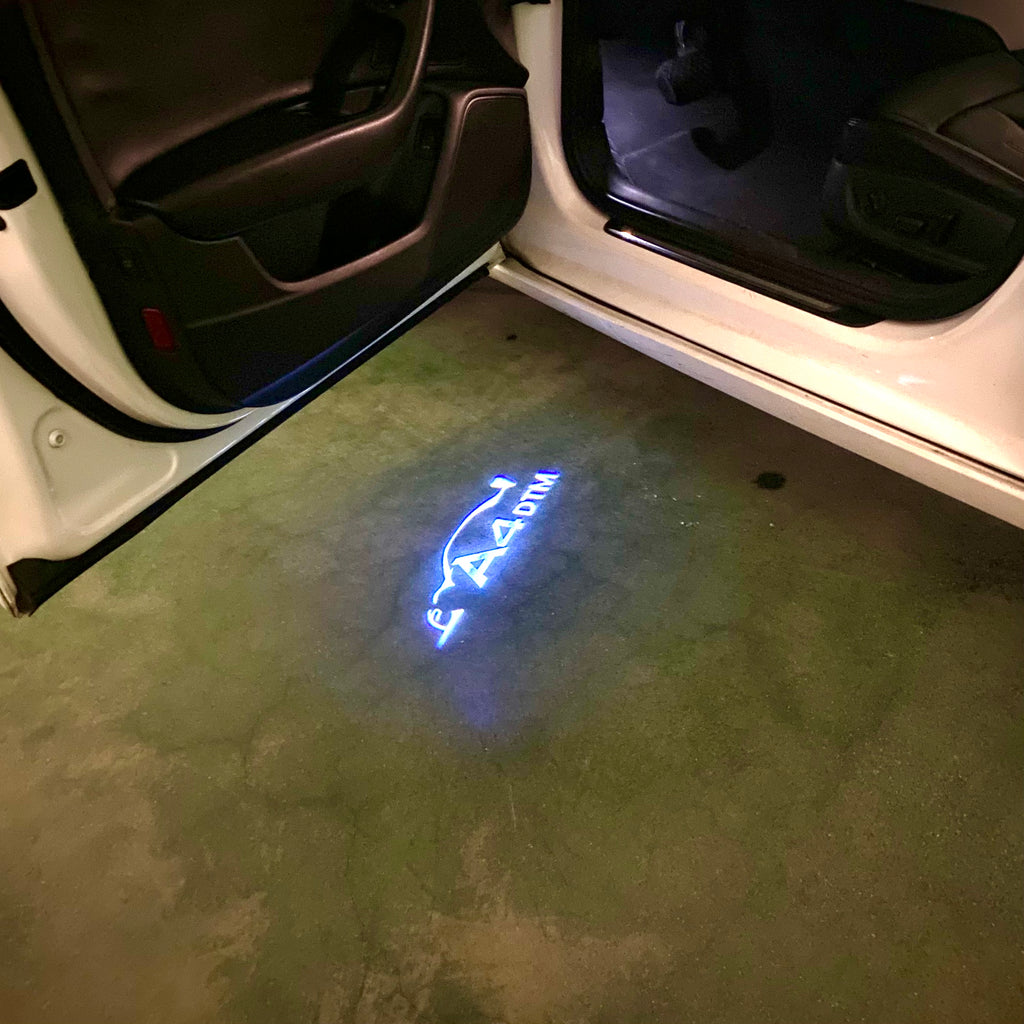 AUDI  A4 LOGO PROJECTOT LIGHTS  (quantity 1 = 2 Logo Films /2 door lights）Nr.12B79