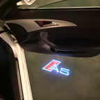 AUDI LOGO PROJECTOT LIGHTS Nr.120 (الكمية 1 = 2 Logo Films /2 أضواء الباب)