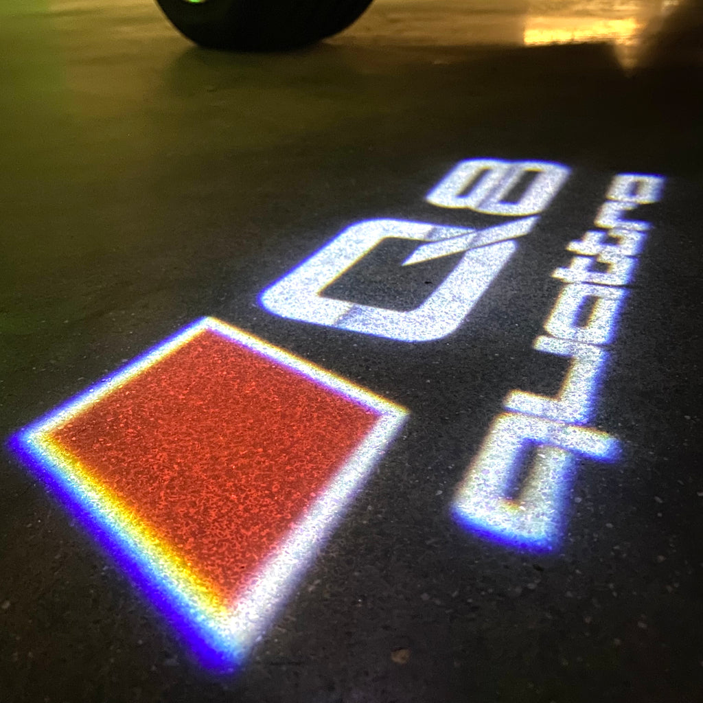 AUDI LOGO PROJECTOT LIGHTS Nr.120 (الكمية 1 = 2 Logo Films /2 أضواء الباب)