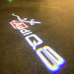 AUDI LOGO PROJECTOT LIGHTS Nr.120 (الكمية 1 = 2 Logo Films /2 أضواء الباب)