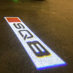 AUDI LOGO PROJECTOT LIGHTS Nr.120 (الكمية 1 = 2 Logo Films /2 أضواء الباب)