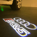 AUDI LOGO PROJECTOT LIGHTS Nr.120 (الكمية 1 = 2 Logo Films /2 أضواء الباب)