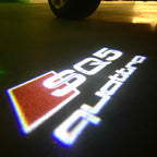 AUDI LOGO PROJECTOT LIGHTS Nr.120 (الكمية 1 = 2 Logo Films /2 أضواء الباب)
