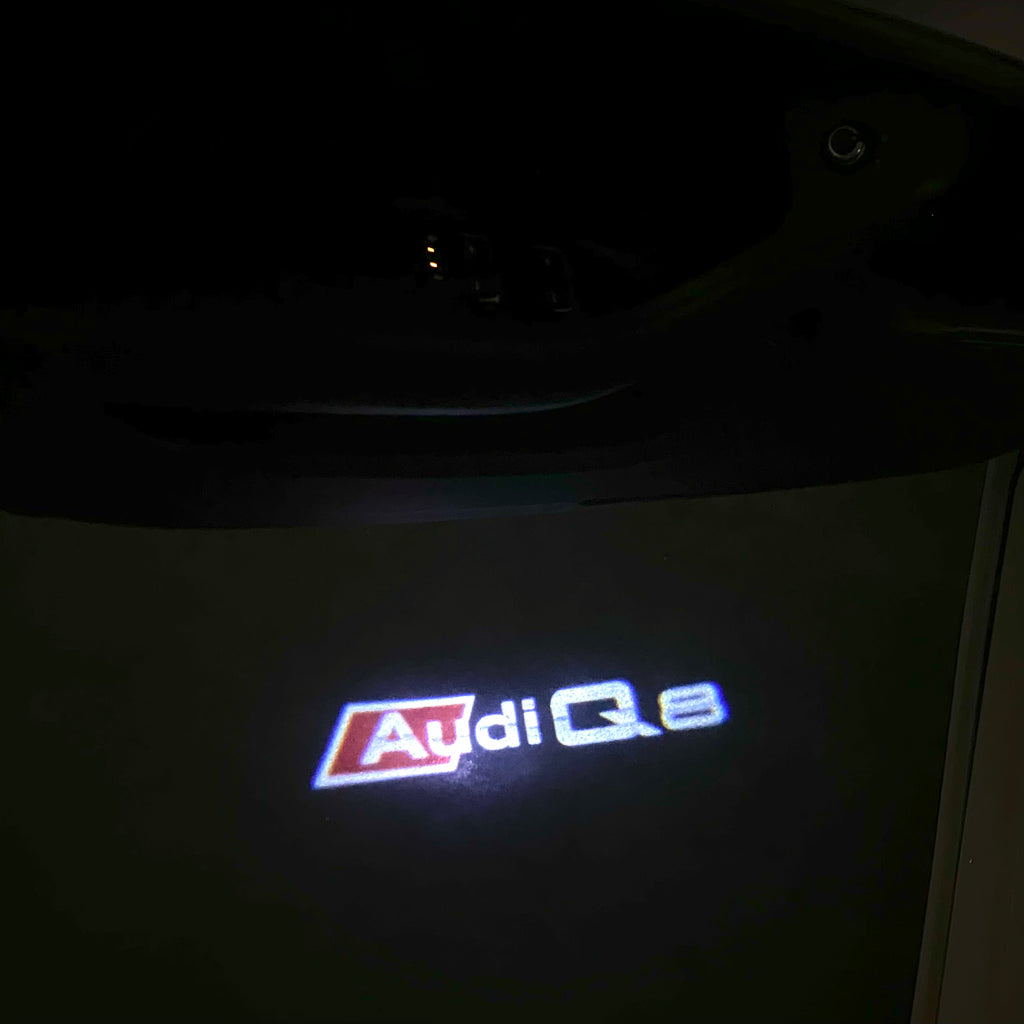 AUDI LOGO PROJECTOT LIGHTS Nr.120 (الكمية 1 = 2 Logo Films /2 أضواء الباب)