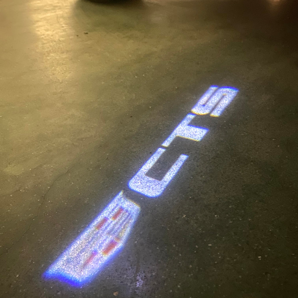 AUDI LOGO PROJECTOT LIGHTS Nr.19 (الكمية 1 = 2 Logo Films /2 أضواء الباب)