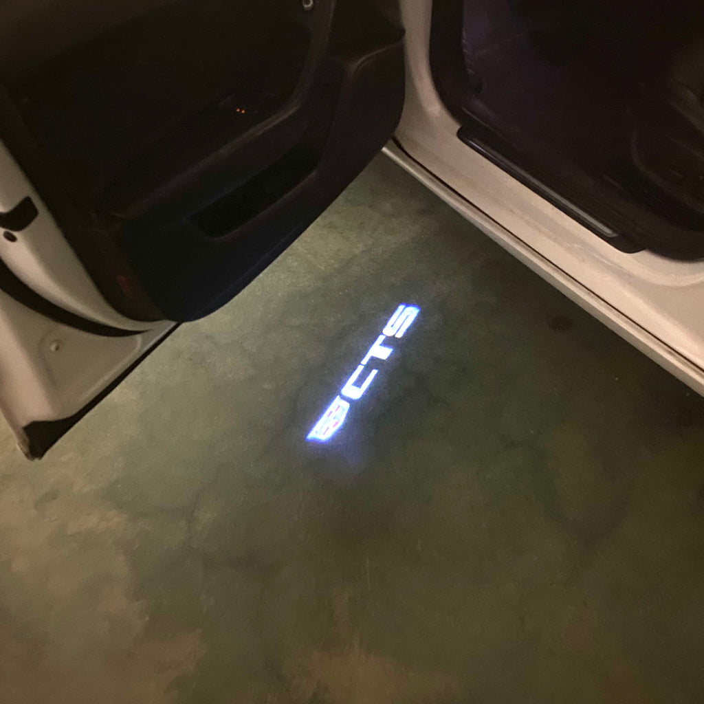 AUDI LOGO PROJECTOT LIGHTS Nr.19 (الكمية 1 = 2 Logo Films /2 أضواء الباب)