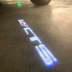 AUDI LOGO PROJECTOT LIGHTS Nr.19 (الكمية 1 = 2 Logo Films /2 أضواء الباب)