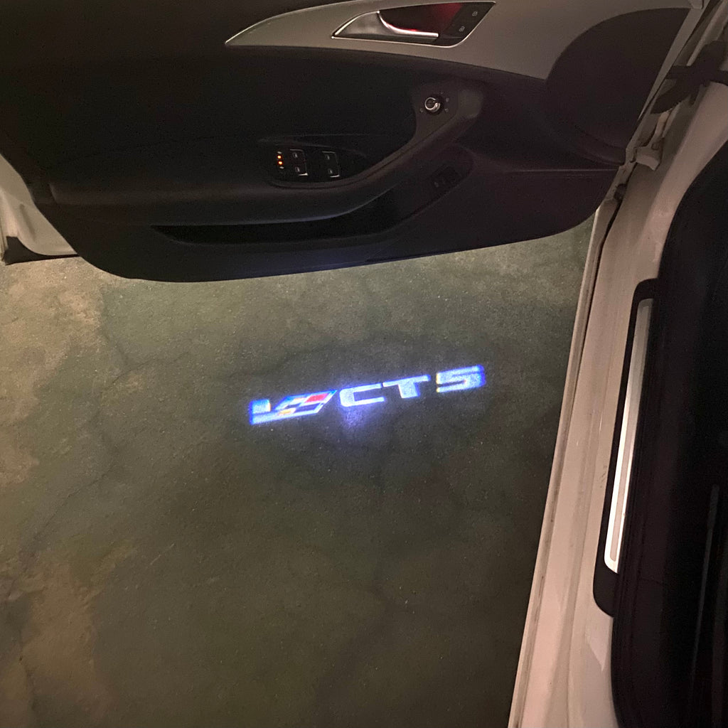 AUDI LOGO PROJECTOT LIGHTS Nr.19 (الكمية 1 = 2 Logo Films /2 أضواء الباب)