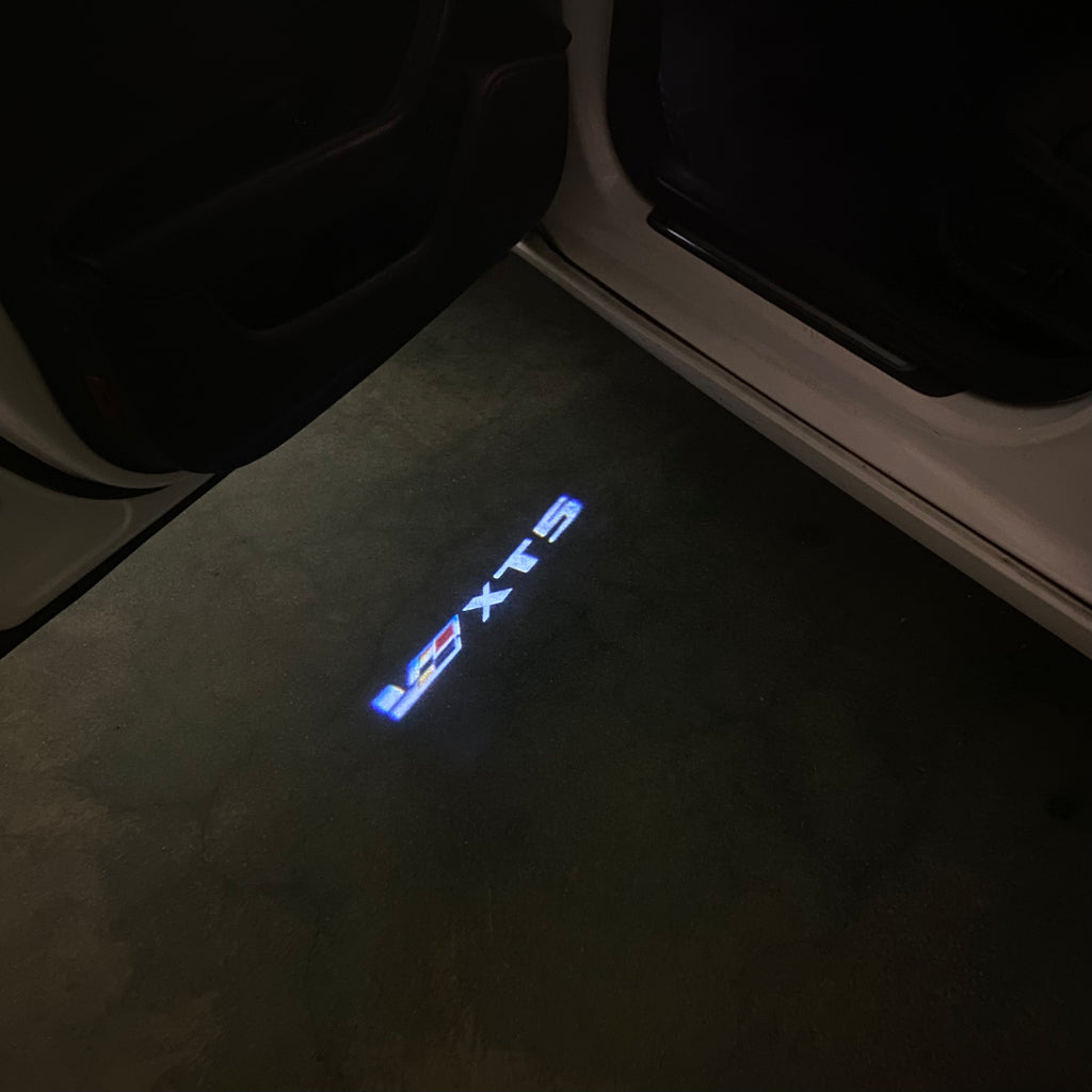 AUDI LOGO PROJECTOT LIGHTS Nr.19 (الكمية 1 = 2 Logo Films /2 أضواء الباب)