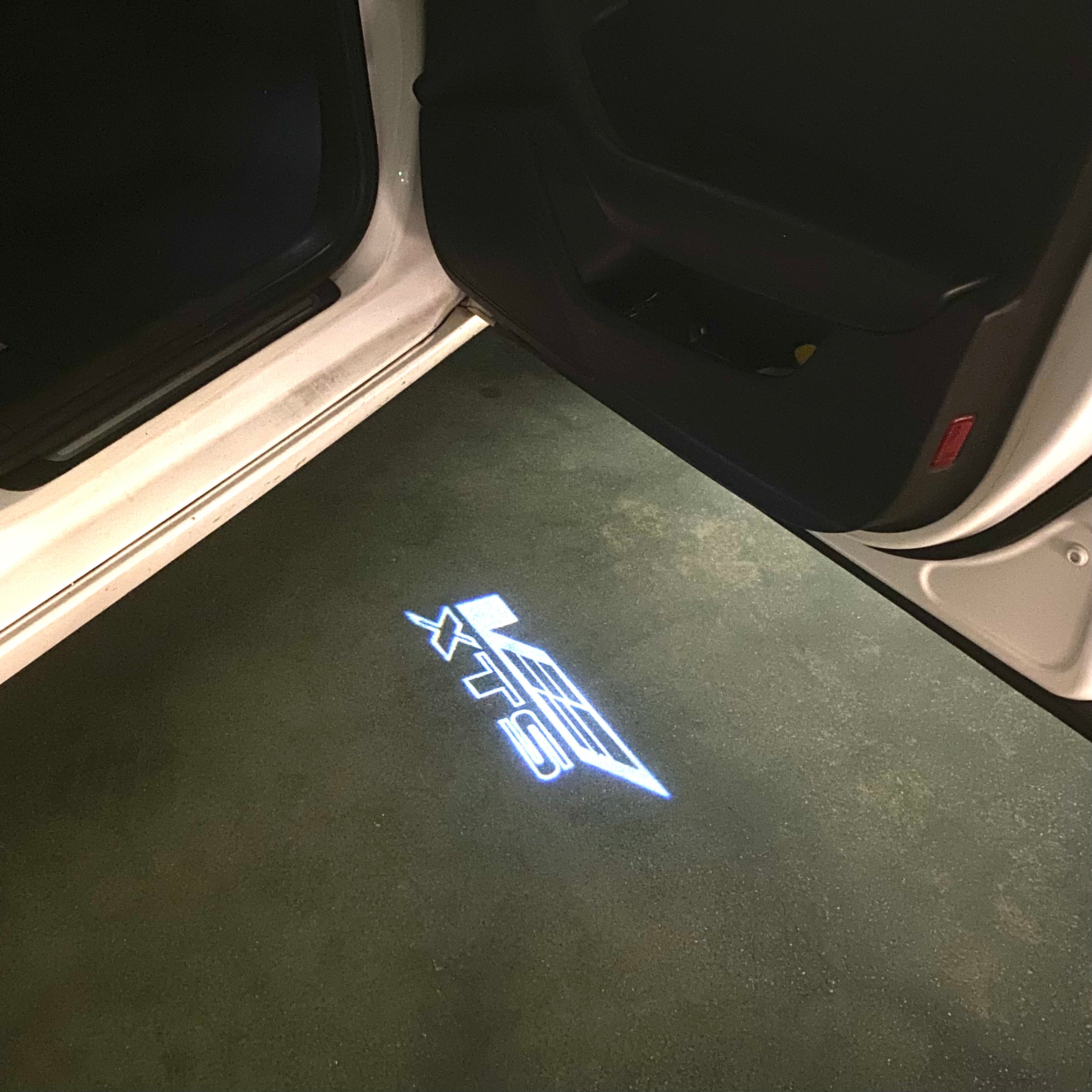 AUDI LOGO PROJECTOT LIGHTS Nr.19 (الكمية 1 = 2 Logo Films /2 أضواء الباب)