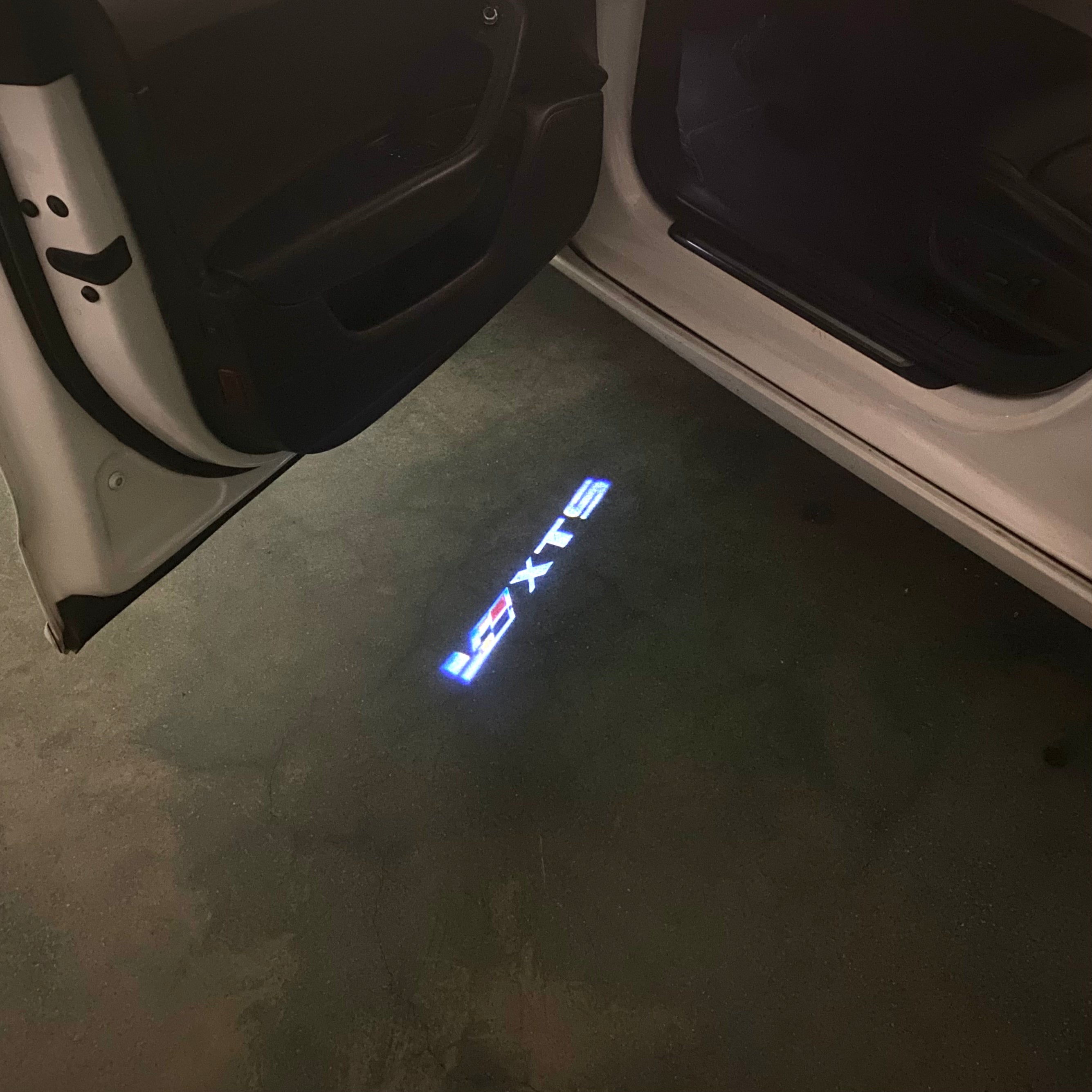 AUDI LOGO PROJECTOT LIGHTS Nr.19 (الكمية 1 = 2 Logo Films /2 أضواء الباب)