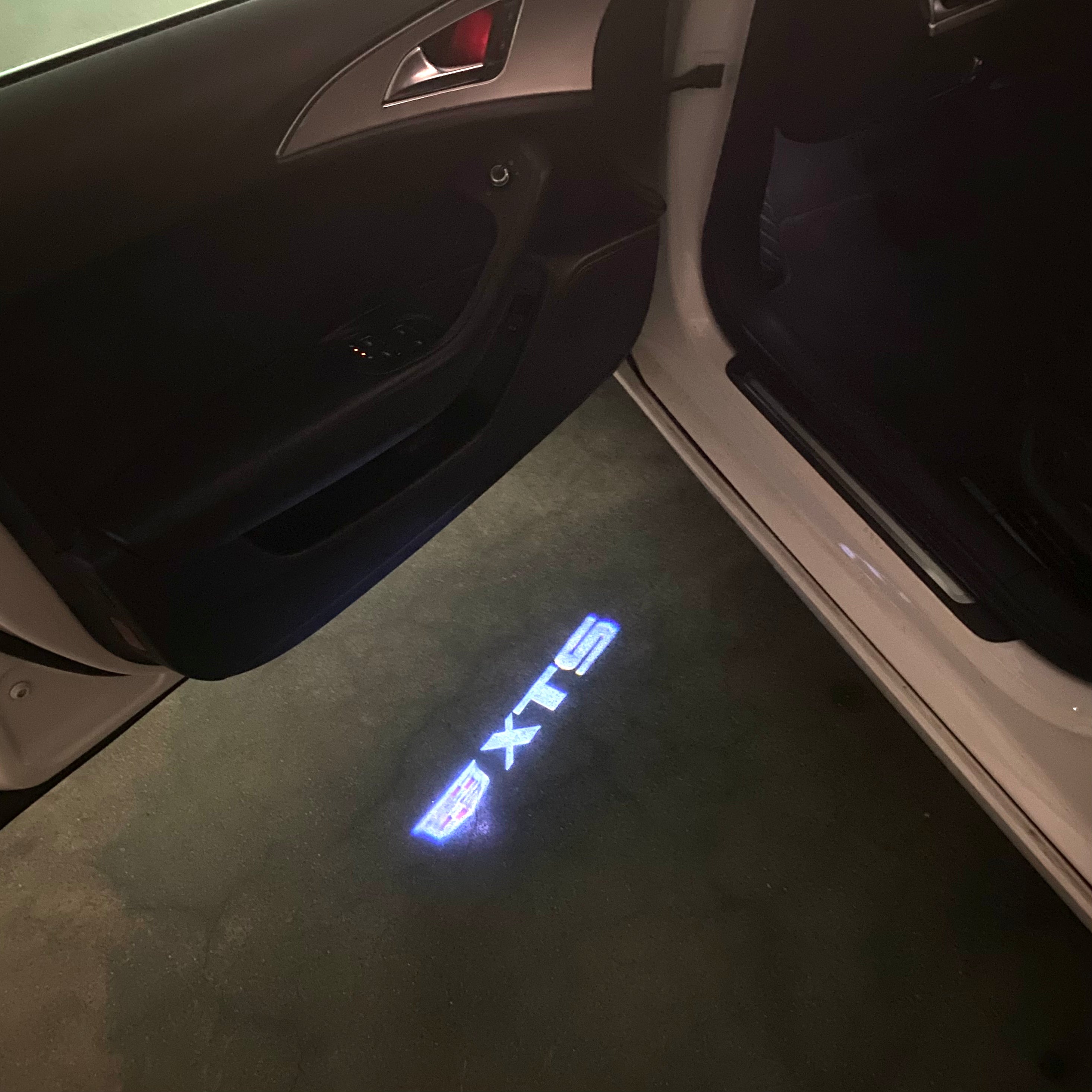 AUDI LOGO PROJECTOT LIGHTS Nr.19 (الكمية 1 = 2 Logo Films /2 أضواء الباب)