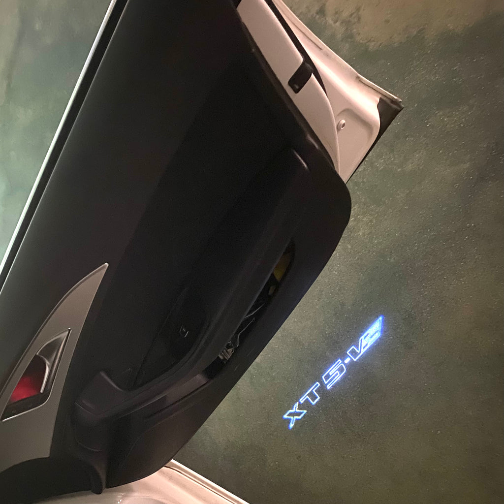 AUDI LOGO PROJECTOT LIGHTS Nr.19 (الكمية 1 = 2 Logo Films /2 أضواء الباب)