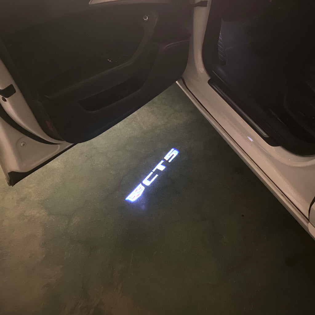 AUDI LOGO PROJECTOT LIGHTS Nr.19 (الكمية 1 = 2 Logo Films /2 أضواء الباب)