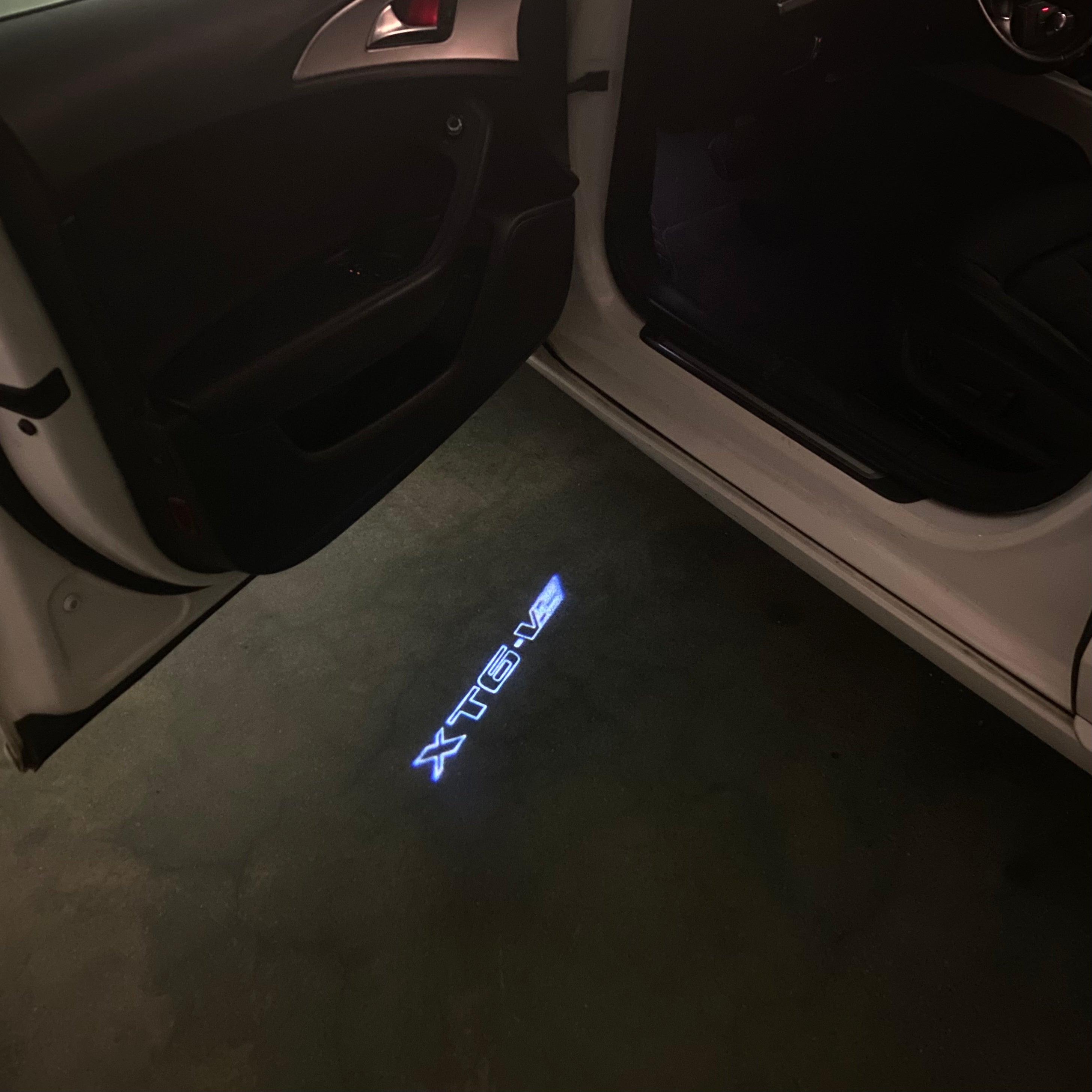 AUDI LOGO PROJECTOT LIGHTS Nr.19 (الكمية 1 = 2 Logo Films /2 أضواء الباب)