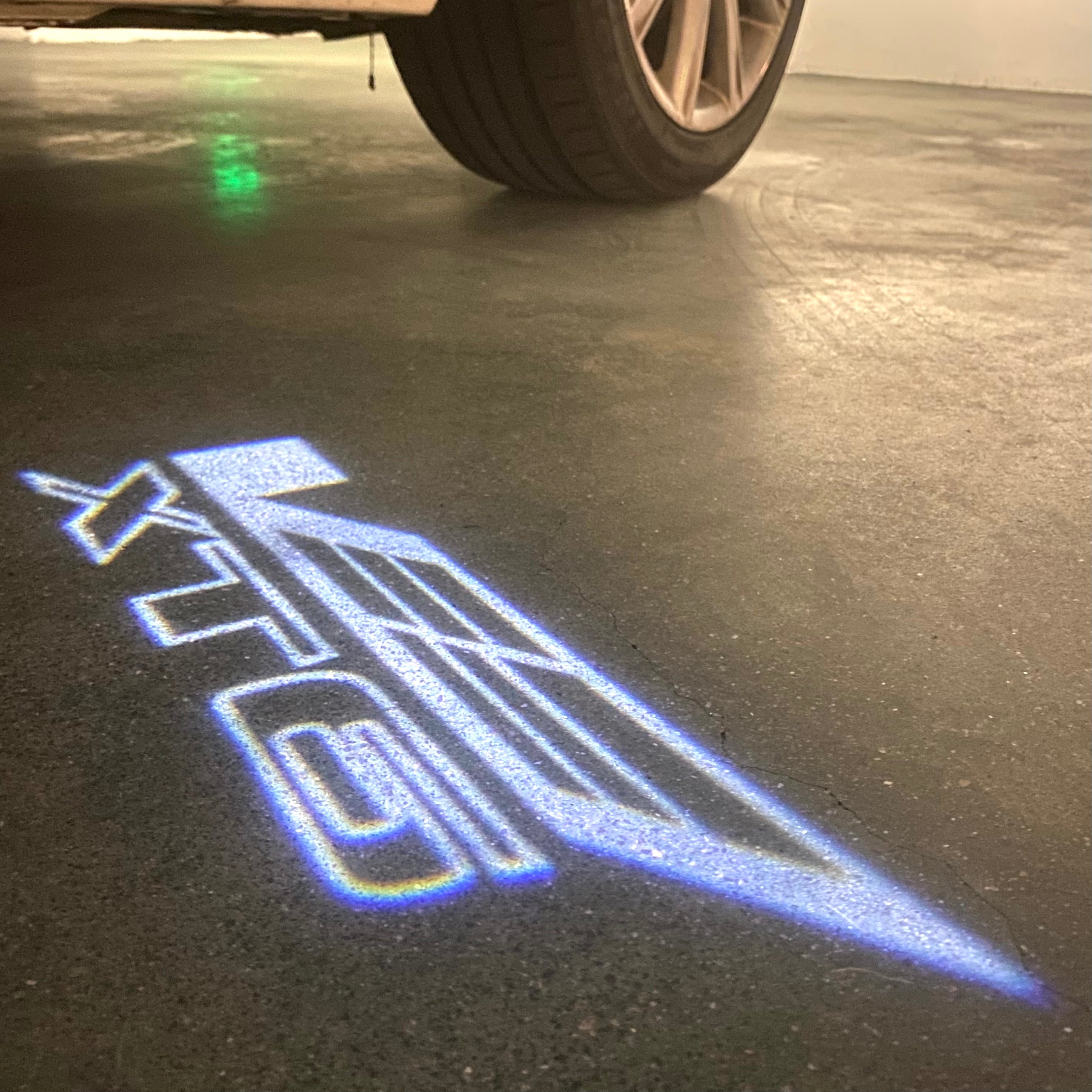 AUDI LOGO PROJECTOT LIGHTS Nr.19 (الكمية 1 = 2 Logo Films /2 أضواء الباب)