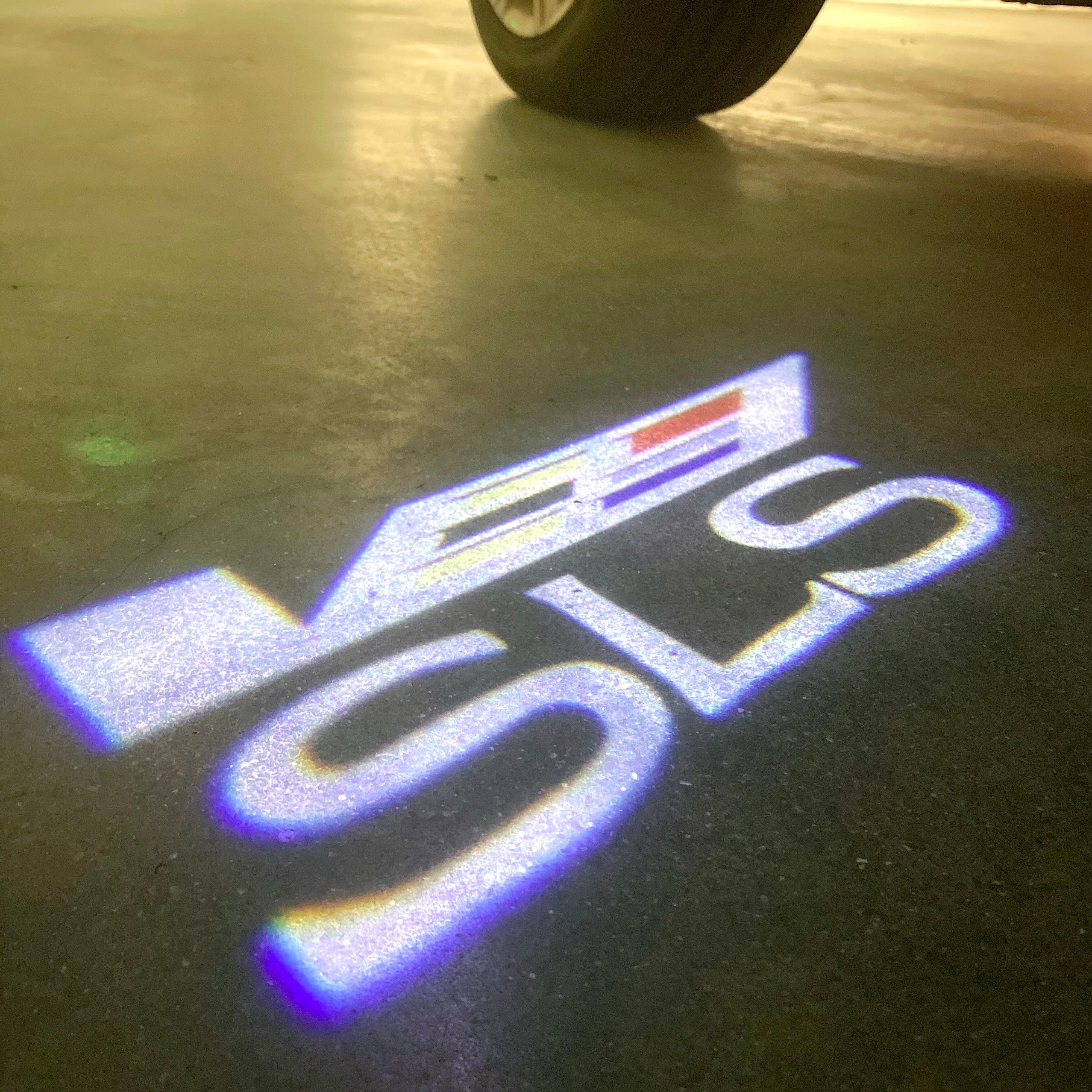 AUDI LOGO PROJECTOT LIGHTS Nr.19 (الكمية 1 = 2 Logo Films /2 أضواء الباب)