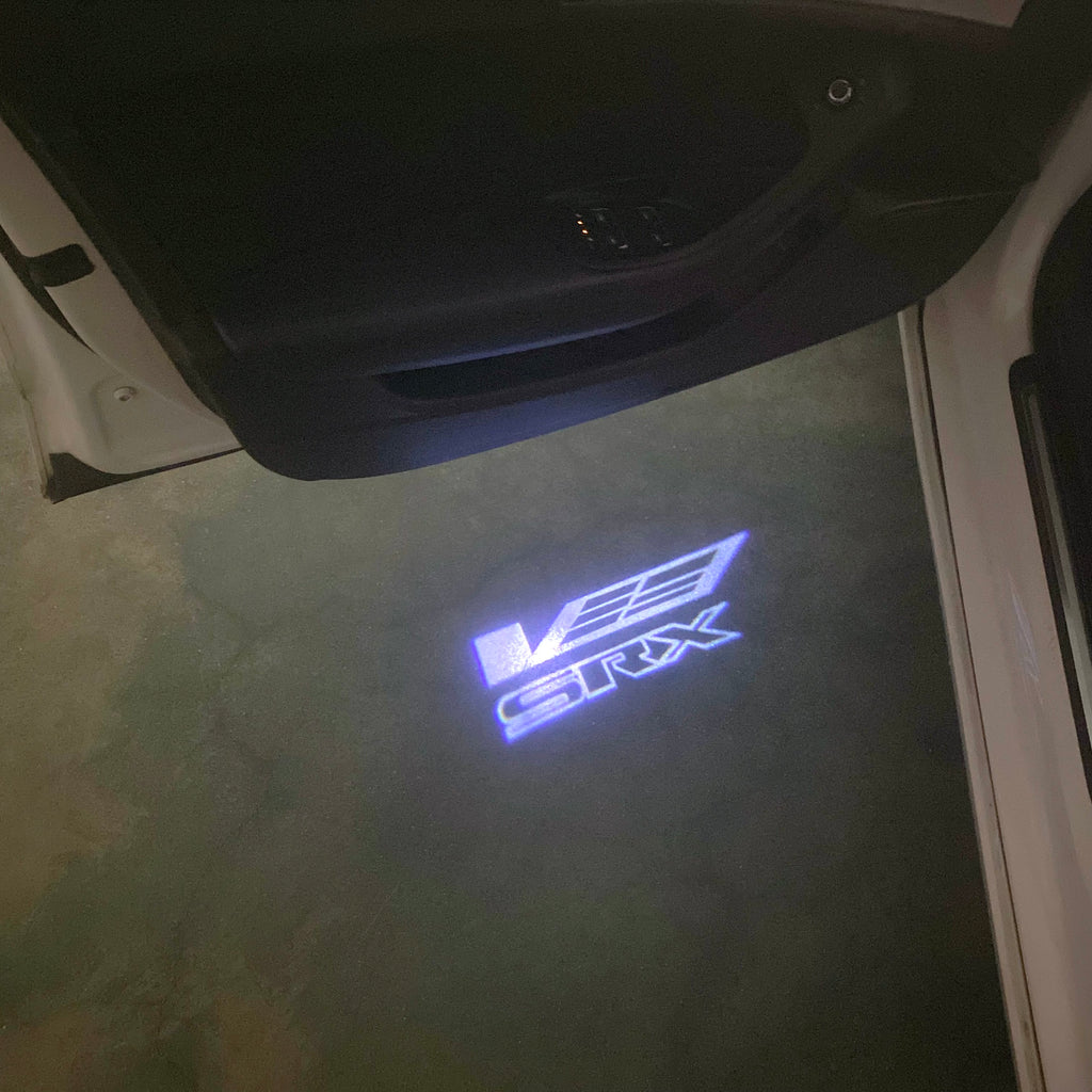 AUDI LOGO PROJECTOT LIGHTS Nr.19 (الكمية 1 = 2 Logo Films /2 أضواء الباب)