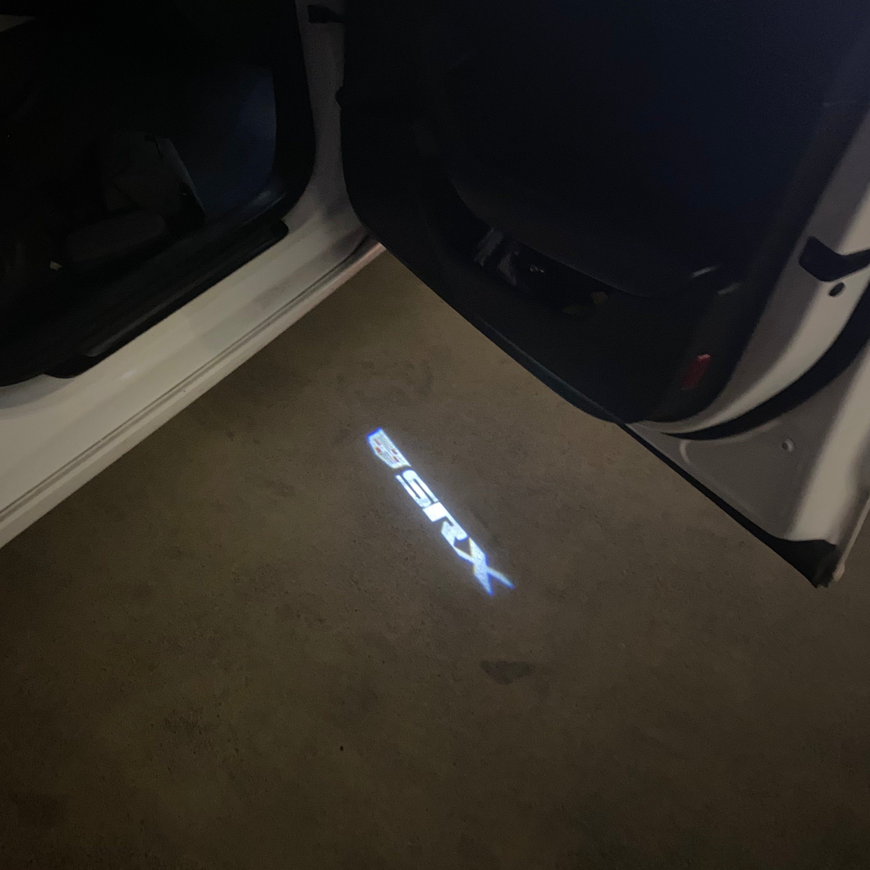 AUDI LOGO PROJECTOT LIGHTS Nr.19 (الكمية 1 = 2 Logo Films /2 أضواء الباب)