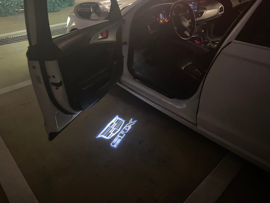 AUDI LOGO PROJECTOT LIGHTS Nr.19 (الكمية 1 = 2 Logo Films /2 أضواء الباب)