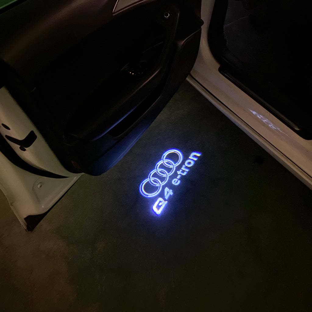 AUDI LOGO PROJECTOT LIGHTS Nr.120 (الكمية 1 = 2 Logo Films /2 أضواء الباب)