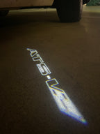 AUDI LOGO PROJECTOT LIGHTS Nr.19 (الكمية 1 = 2 Logo Films /2 أضواء الباب)