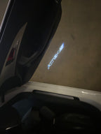 AUDI LOGO PROJECTOT LIGHTS Nr.19 (الكمية 1 = 2 Logo Films /2 أضواء الباب)