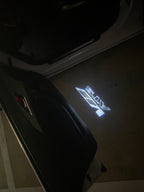 AUDI LOGO PROJECTOT LIGHTS Nr.19 (الكمية 1 = 2 Logo Films /2 أضواء الباب)