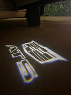 AUDI LOGO PROJECTOT LIGHTS Nr.19 (الكمية 1 = 2 Logo Films /2 أضواء الباب)