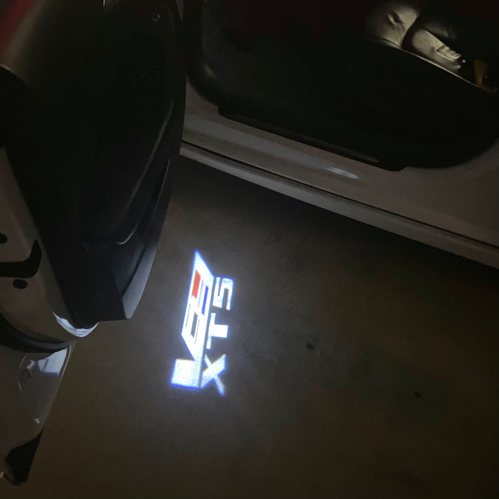 AUDI LOGO PROJECTOT LIGHTS Nr.19 (الكمية 1 = 2 Logo Films /2 أضواء الباب)