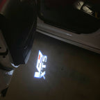 AUDI LOGO PROJECTOT LIGHTS Nr.19 (الكمية 1 = 2 Logo Films /2 أضواء الباب)