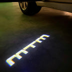 AUDI LOGO PROJECTOT LIGHTS Nr.86 (الكمية 1 = 2 Logo Films /2 أضواء الباب)