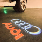 AUDI LOGO PROJECTOT LIGHTS Nr.17 (الكمية 1 = 2 Logo Films /2 أضواء الباب)