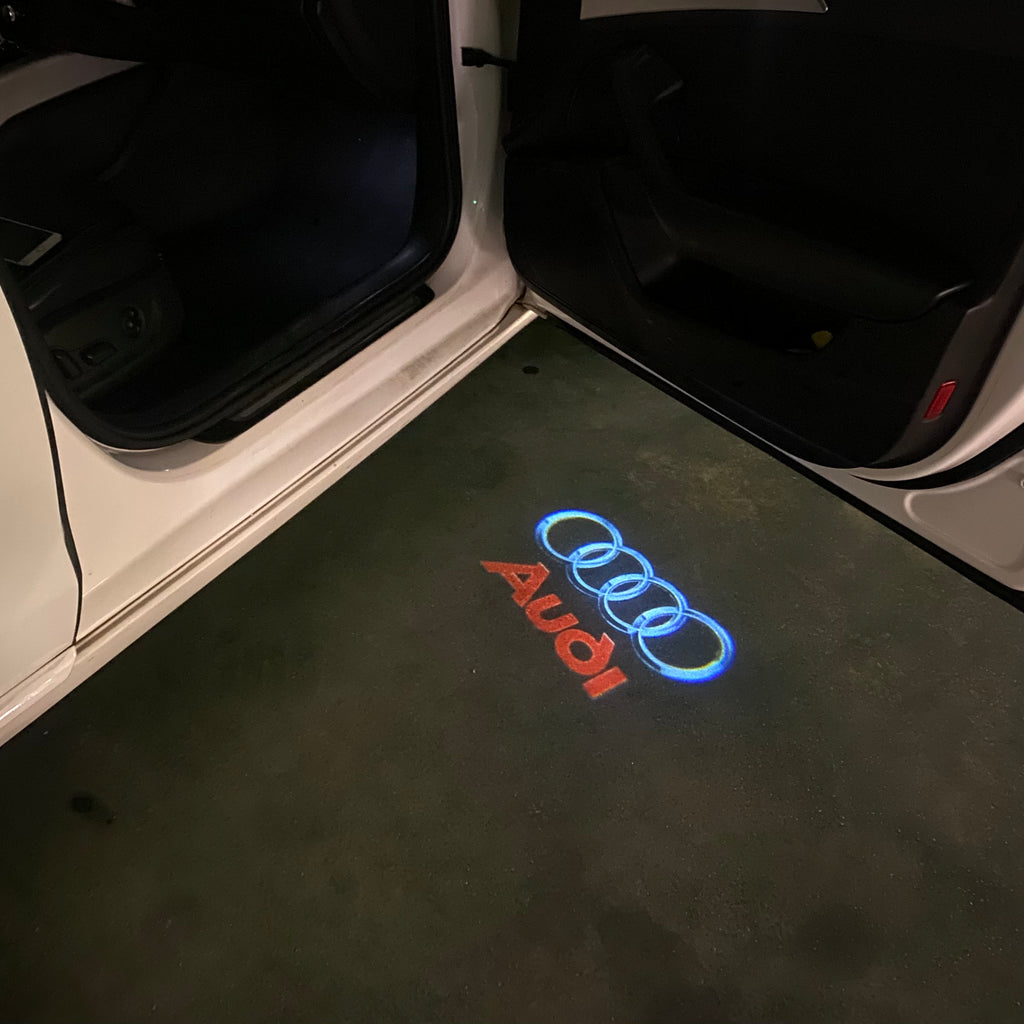 AUDI LOGO PROJECTOT LIGHTS Nr.17 (الكمية 1 = 2 Logo Films /2 أضواء الباب)