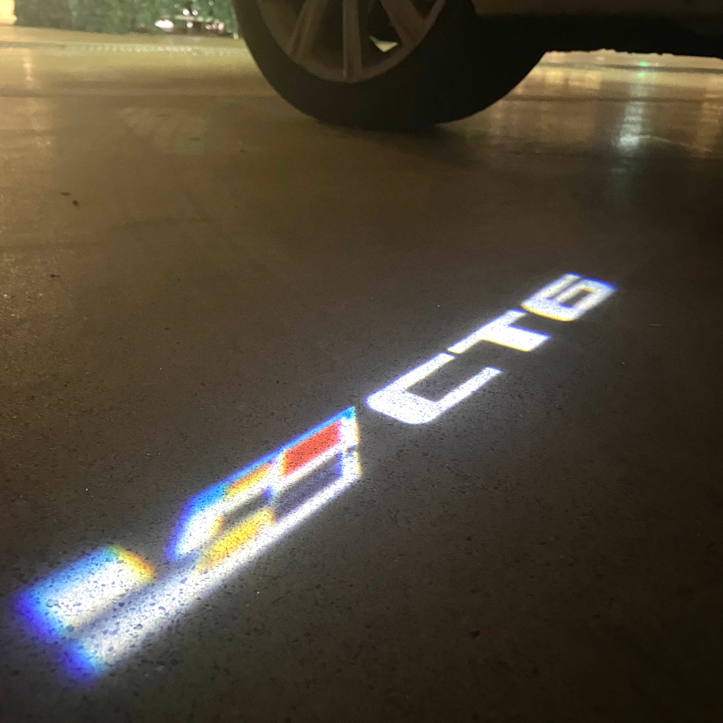 AUDI LOGO PROJECTOT LIGHTS Nr.19 (الكمية 1 = 2 Logo Films /2 أضواء الباب)