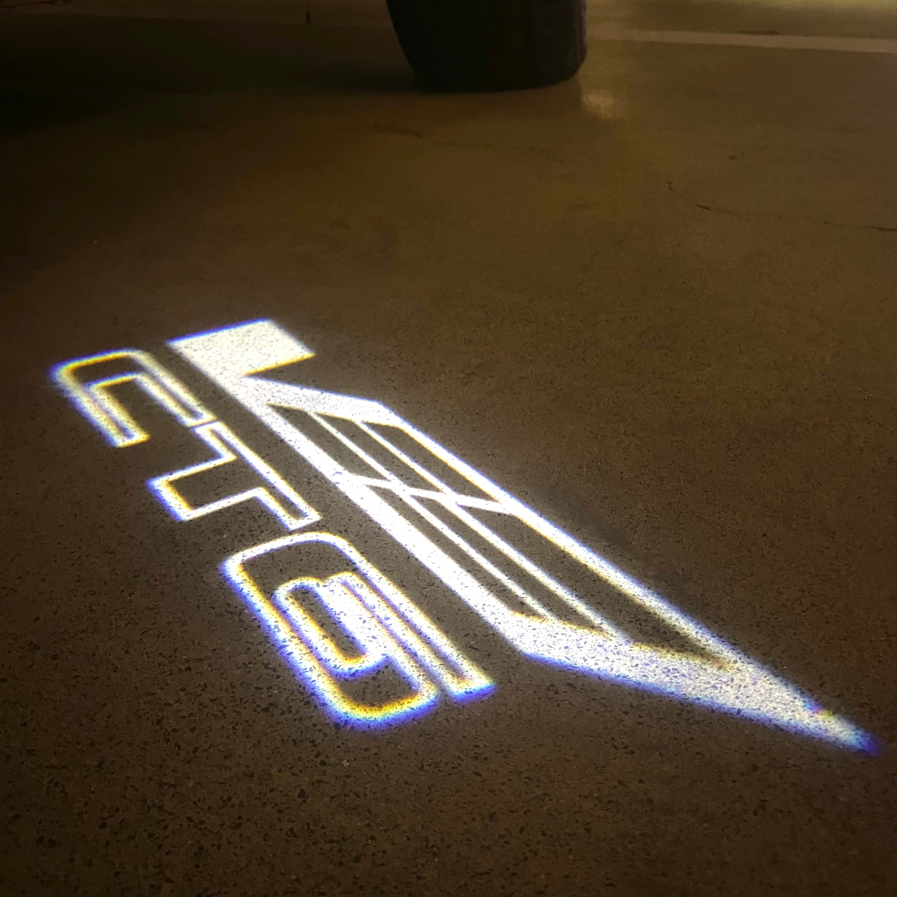 AUDI LOGO PROJECTOT LIGHTS Nr.19 (الكمية 1 = 2 Logo Films /2 أضواء الباب)