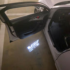 AUDI LOGO PROJECTOT LIGHTS Nr.19 (الكمية 1 = 2 Logo Films /2 أضواء الباب)