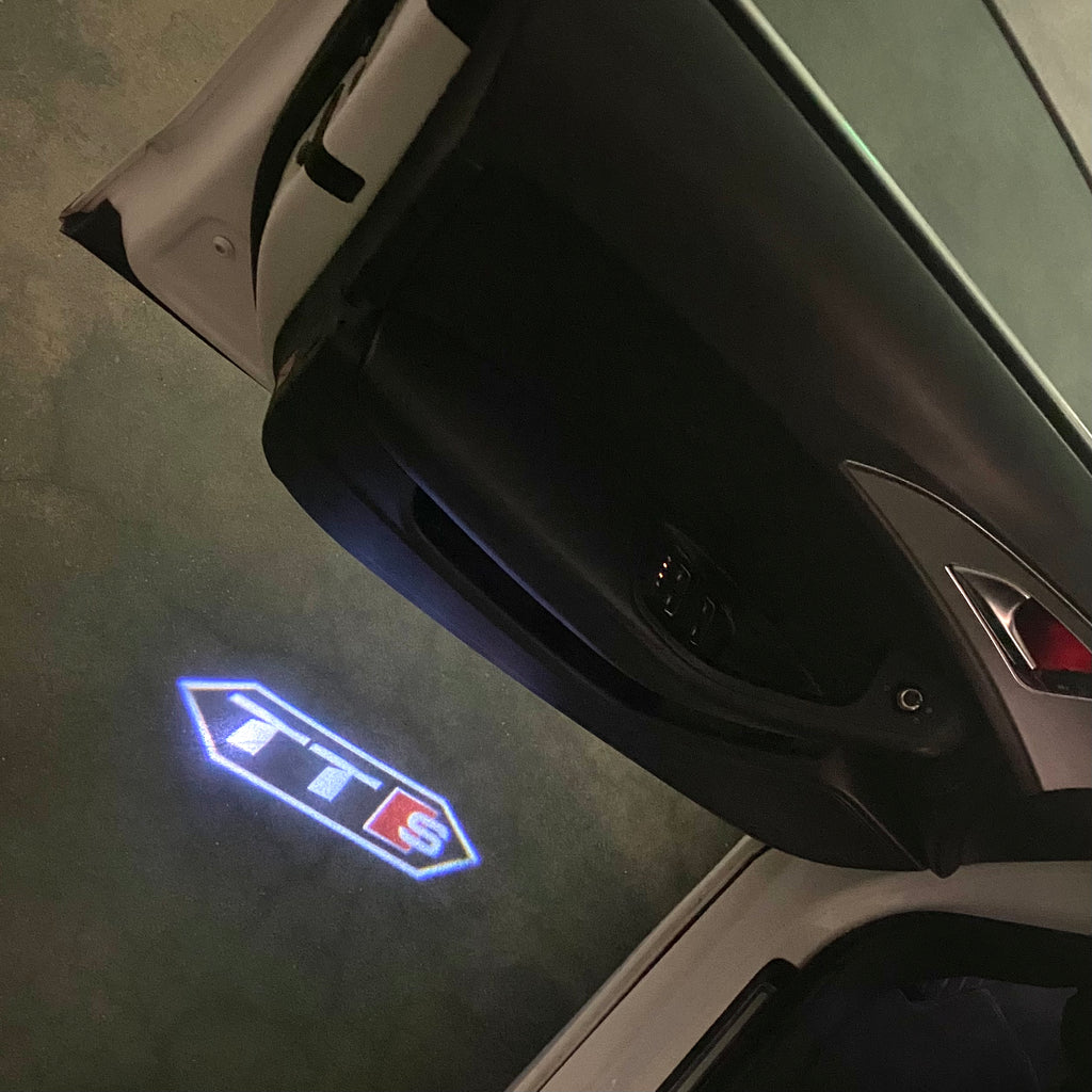 AUDI LOGO PROJECTOT LIGHTS Nr.120 (الكمية 1 = 2 Logo Films /2 أضواء الباب)