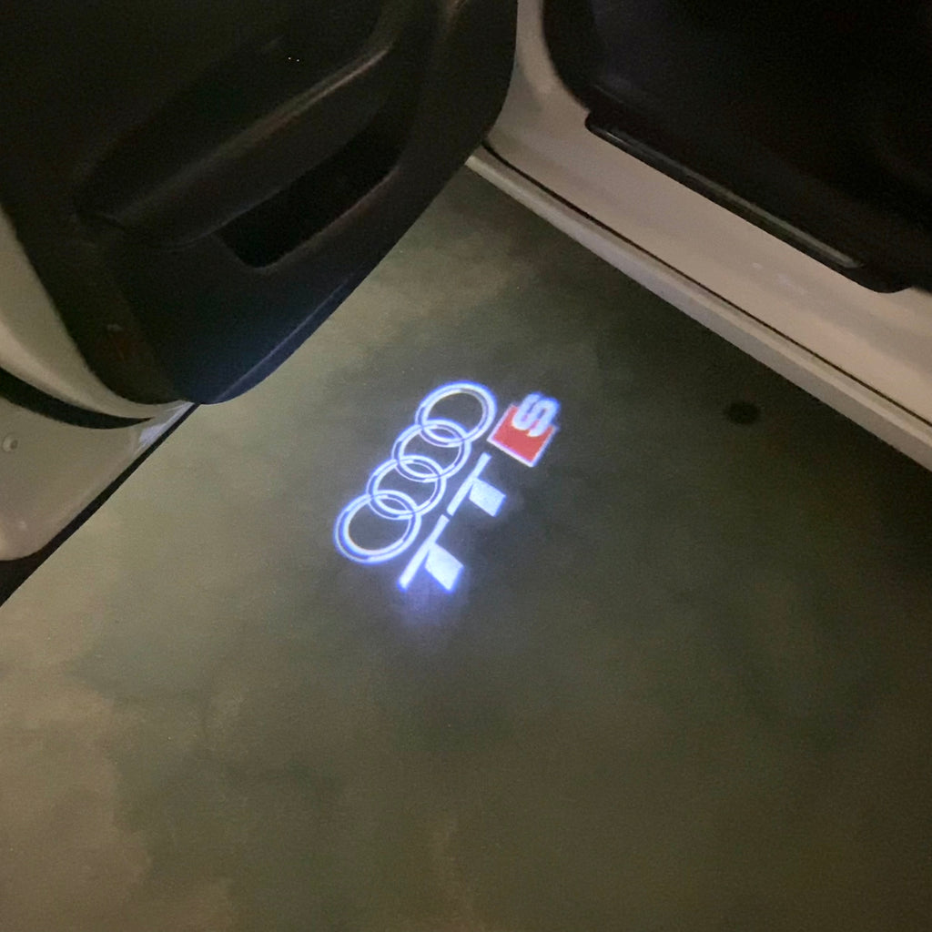 AUDI LOGO PROJECTOT LIGHTS Nr.120 (الكمية 1 = 2 Logo Films /2 أضواء الباب)