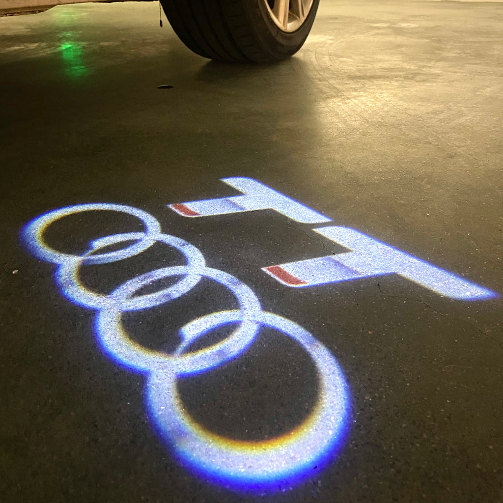 AUDI LOGO PROJECTOT LIGHTS Nr.120 (الكمية 1 = 2 Logo Films /2 أضواء الباب)