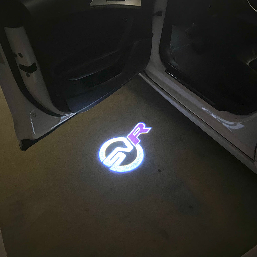 Land Rover LOGO PROJECROTR LIGHTS Nr.04 (الكمية 1 = 1 مجموعة / 2 أضواء باب)