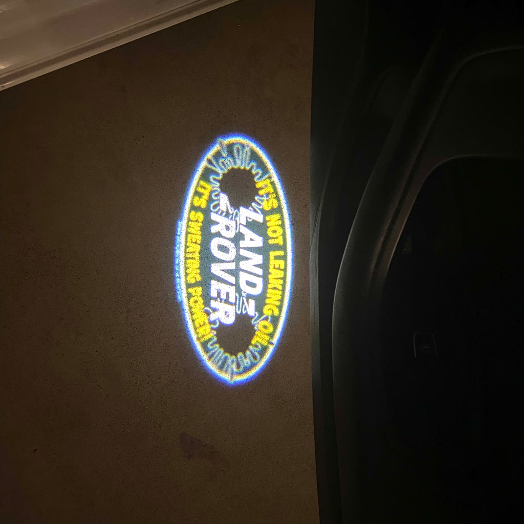 Land Rover LOGO PROJECROTR LIGHTS Nr.04 (الكمية 1 = 1 مجموعة / 2 أضواء باب)