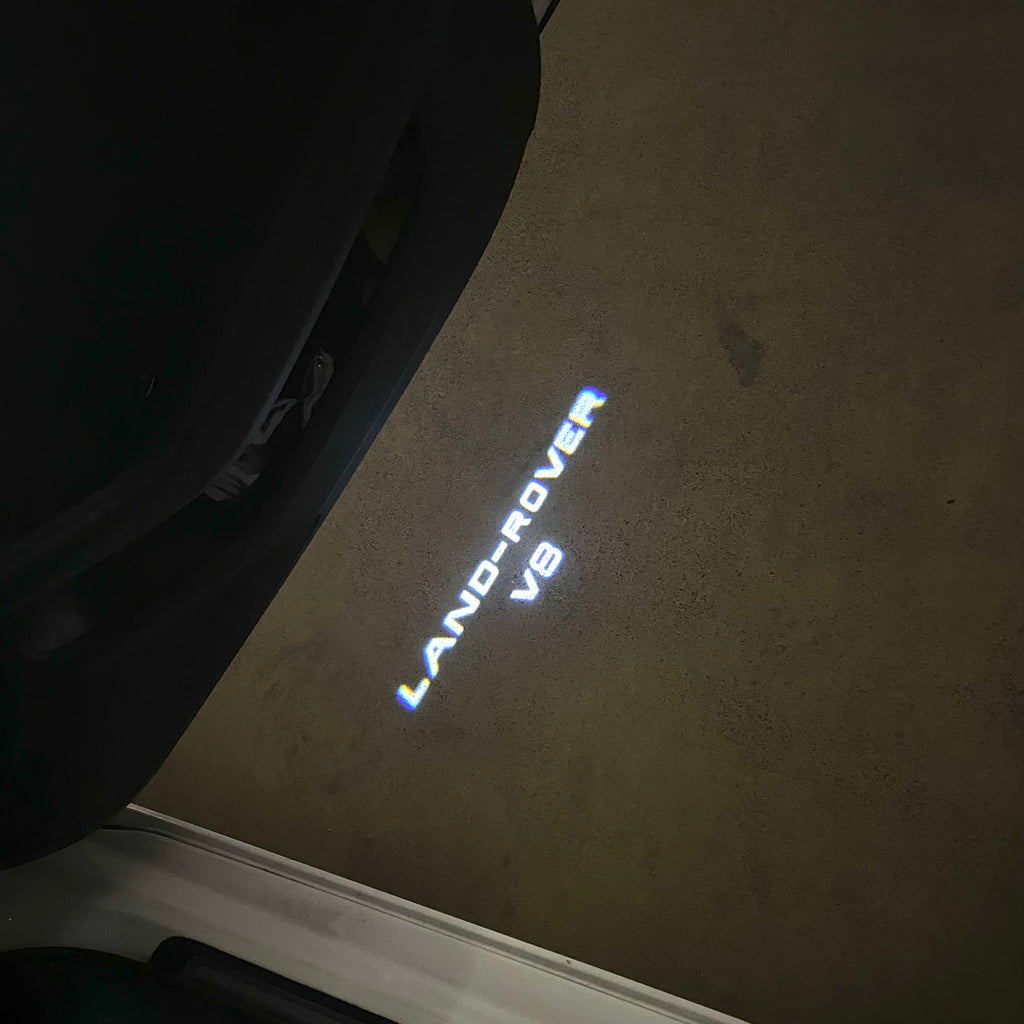Land Rover LOGO PROJECROTR LIGHTS Nr.04 (الكمية 1 = 1 مجموعة / 2 أضواء باب)